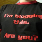 Photo of a t-shirt that reads "I'm blogging this. Are you?"