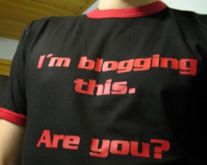 Photo of a t-shirt that reads "I'm blogging this. Are you?"