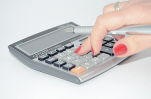 woman-using-calculator